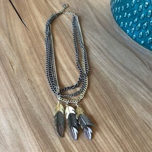 Feather look mixed metal necklace